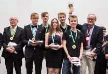 Squeezed in Three Suits by Brian Senior