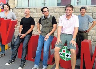 Film Highlighting Growing Interest in Bridge to be shown in Marion by Linda Burchette The Double Dummy production team poses outside the playing site in Taicang, China. From left are Derek Sieg, producer; Darin Moran, director of photography; Lucas Krost, director; John McAllister, producer; and Liming Fan, sound man.