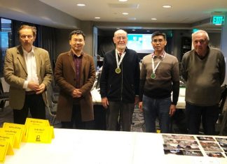 Micro Bridge wins World Computer Championship Hans Leber (Q-Plus Bridge), Yu Peng (Synrey Bridge), Gérard Joyez, accepting the gold medal for Micro Bridge, Zhihui Shi (Synrey Bridge) and Yves Costel (Wbridge5).