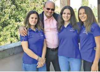 The engineer Andrea Dalpozzo and his three bridge champion daughters